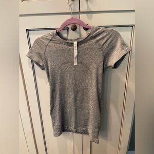 Lululemon grey swiftly tech short sleeve size 4 hip length